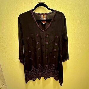 Embroidered blouse, back gathered to enhance shaping